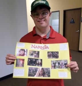 Aaron shows off his Narnia poster