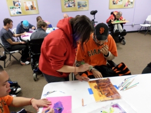 Luis and Hannah making a SF Giants' picture.